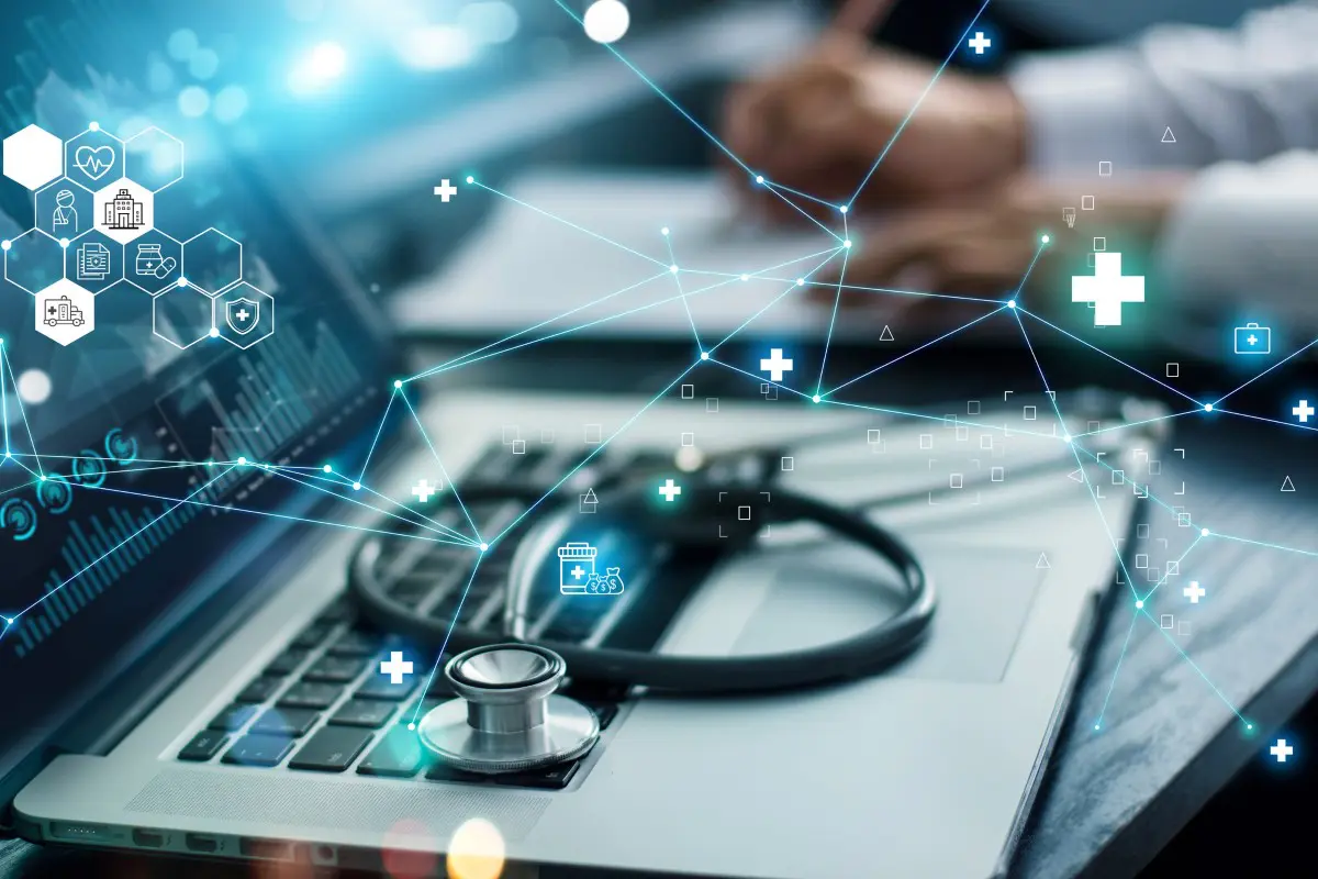 Stethoscope on laptop with digital health icons.