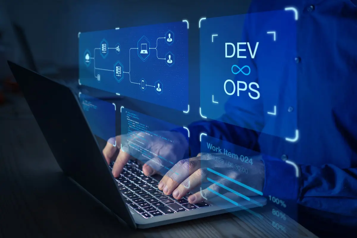 Person working on DevOps laptop interface.