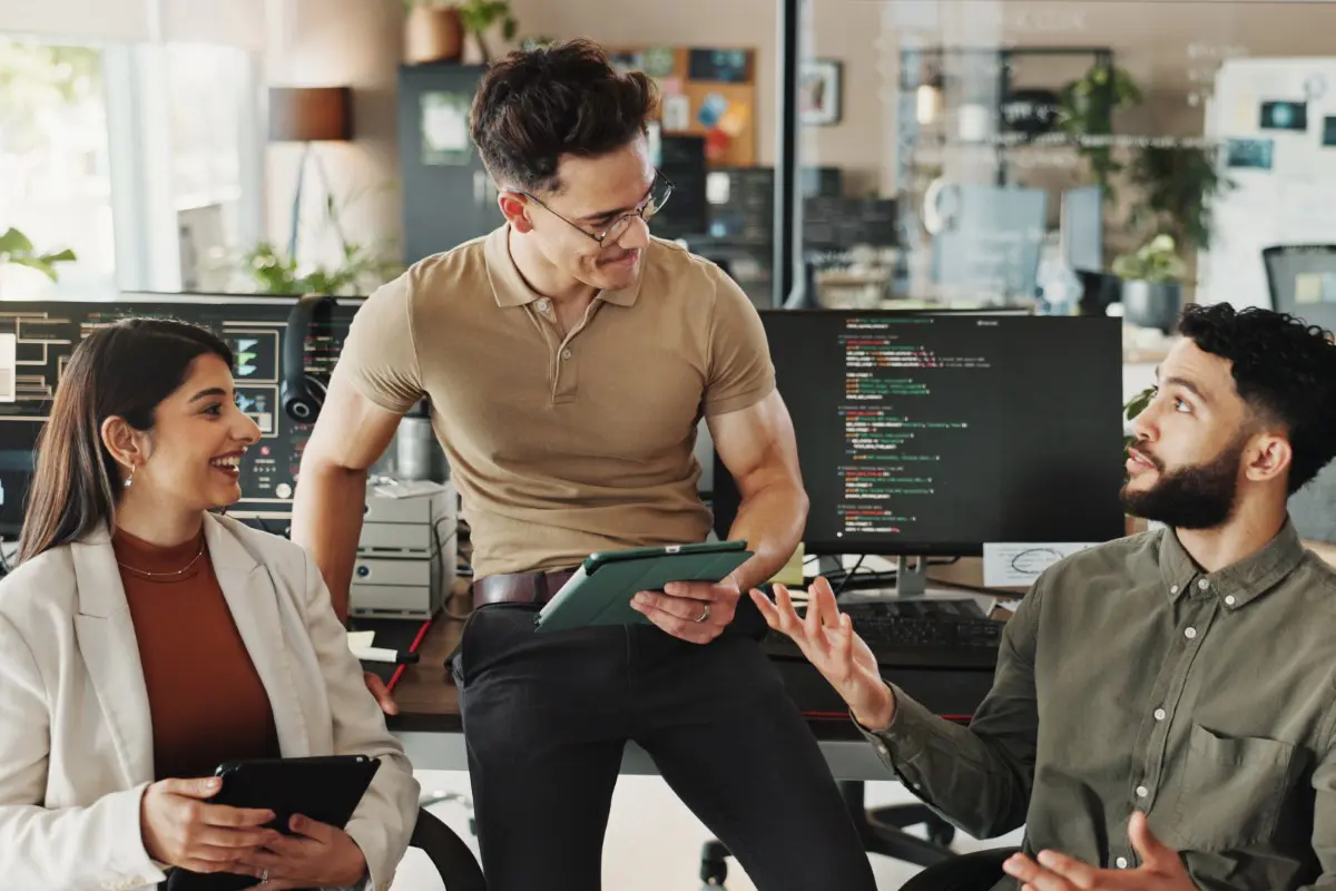 Team discussing in a modern office environment.