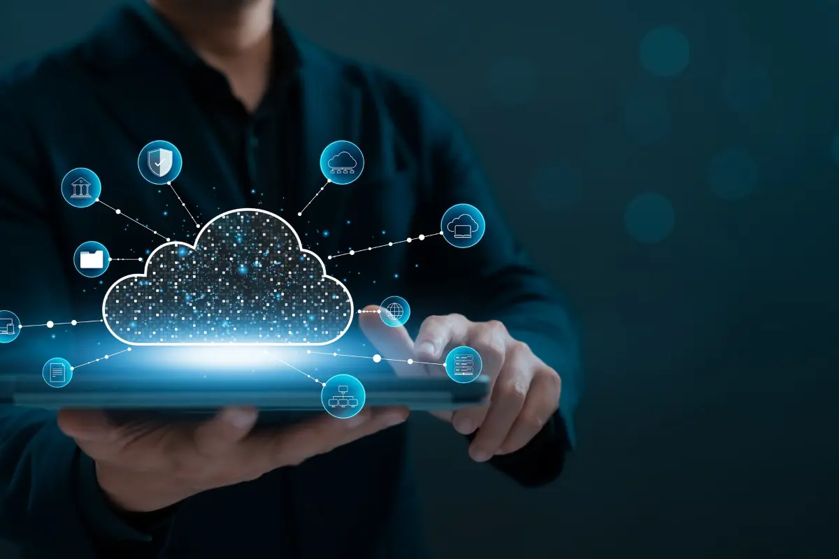 Person interacting with digital cloud technology.